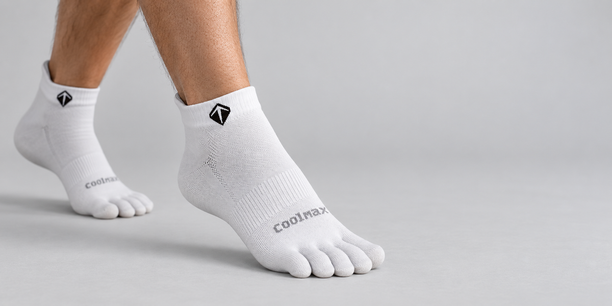 Arch band and heel tab holding the sock in place
